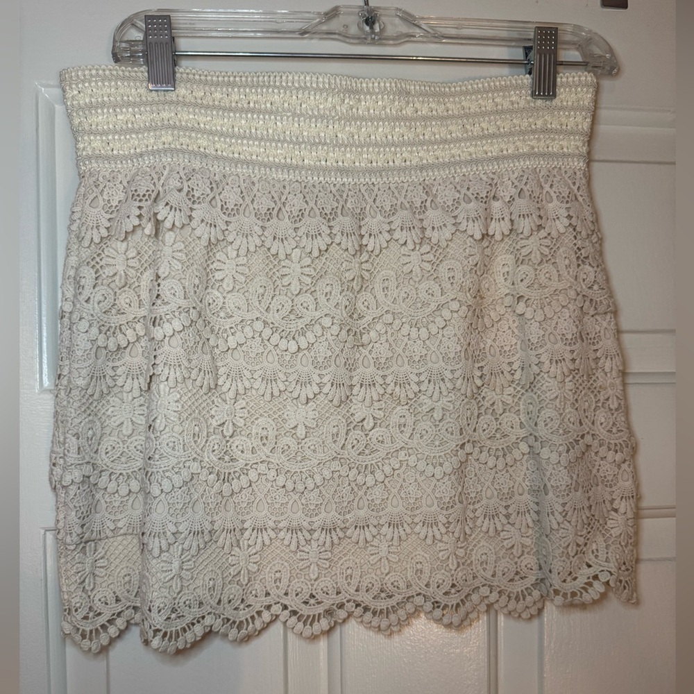 American Rag cream crochet mini skirt.